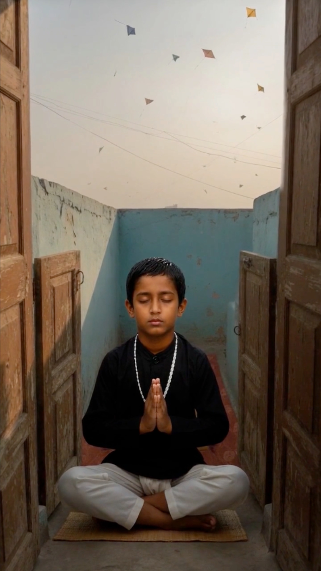 Mukunda meditating in the attic